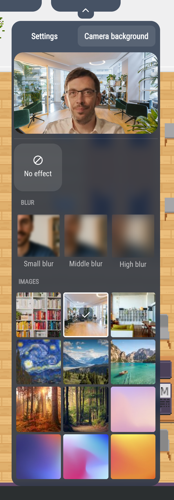 The "Camera background" tab, with an office image behind the camera